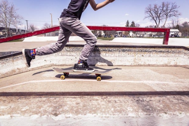 skateboarding kid